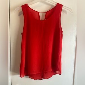 Red sleeveless blouse